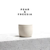 Vela aromática ZENUM Pear & Freesia, perfil floral y afrutado